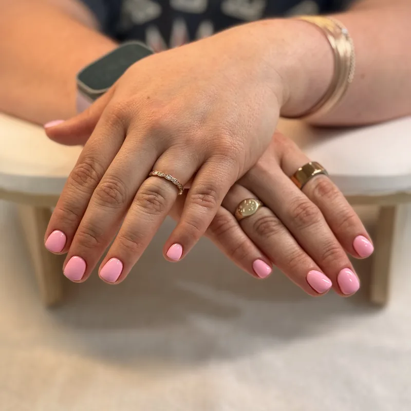 Short almond nails in a soft baby pink.